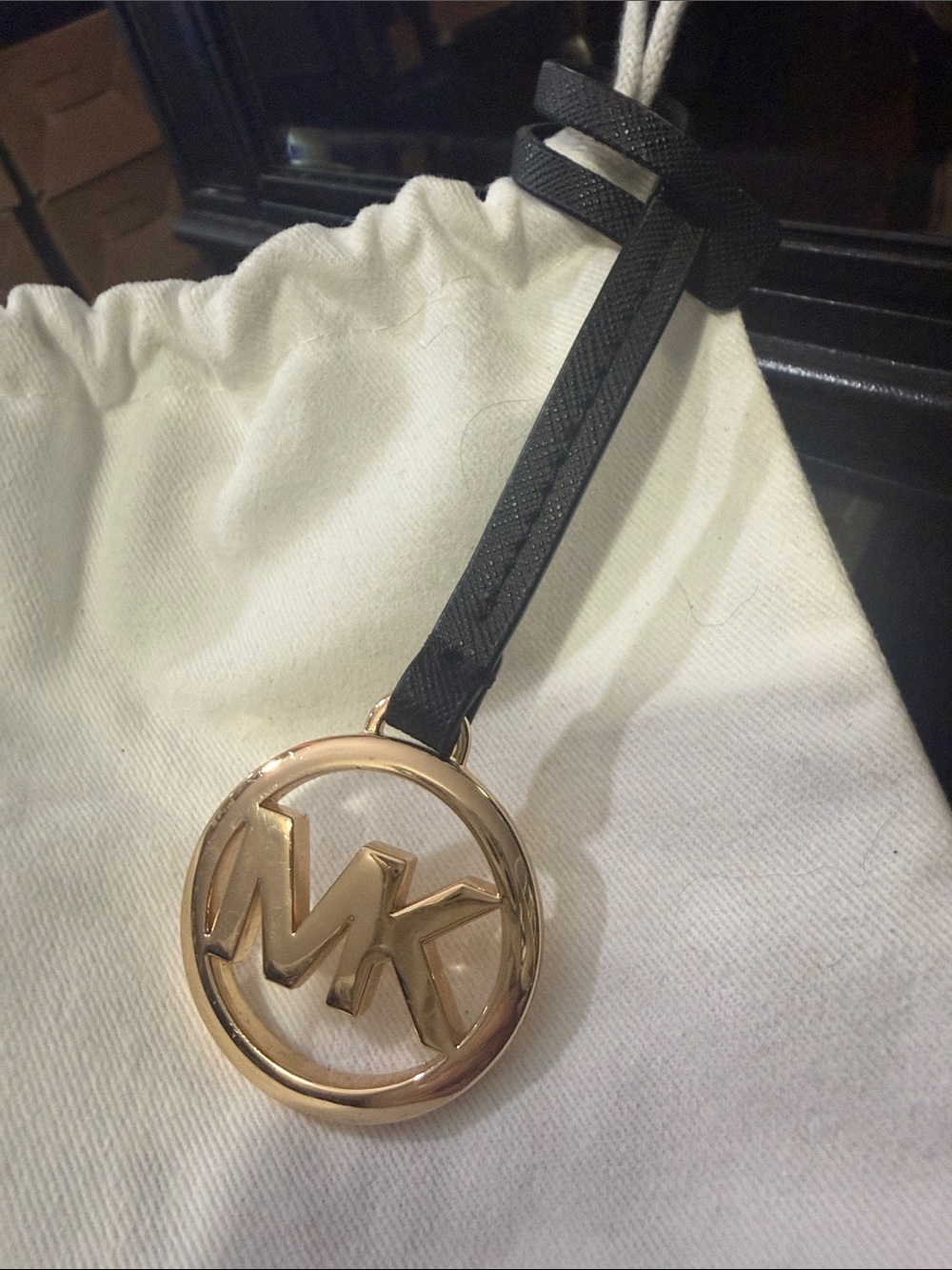 Michael Kors Gold MK Logo Key/bag charm with Black Leather Strap